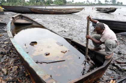 A Fisherman at the site of an oil spill in Niger Delta