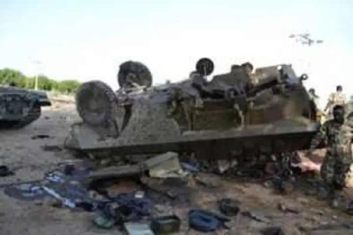 A Boko Haram Armour Carrier turned over by Nigerian military Tank