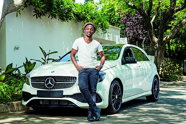 Nathi Mankayi with his New Mercedes-Benz